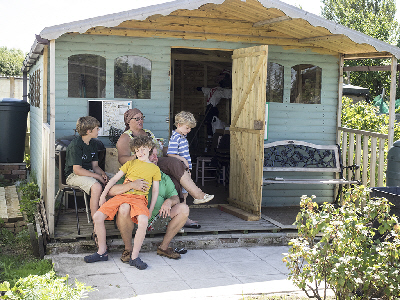 Relaxing on the patio of the community plot